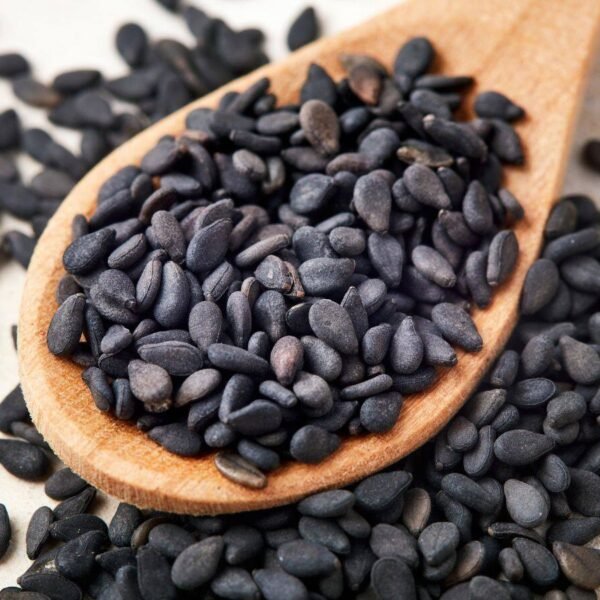 Heap of shiny, jet-black Sesame Seeds (Kala Tal) ready for packing at Jalaram Food Products.